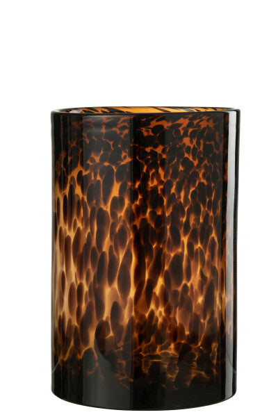 Introduce a touch of luxury to your home decor with our Brown Tortoise Glass Hurricane. The intricate dotted design adds a sophisticated and exclusive touch to any space, while the sturdy glass construction ensures long-lasting use. Available in multiple sizes, this hurricane is perfect for creating an elegant ambiance in any room. Elevate your interior with this exquisite piece.