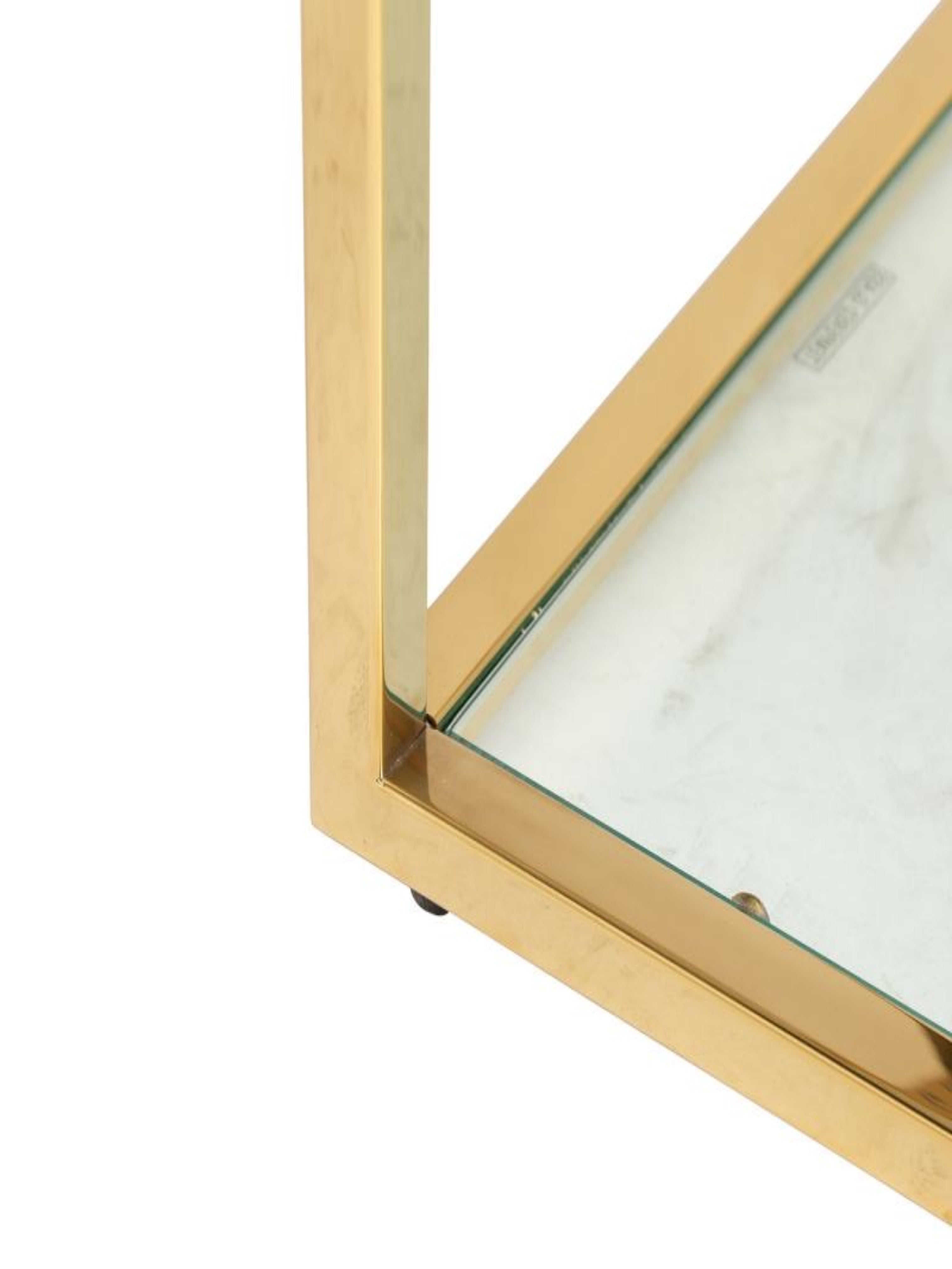 Gold and glass multi tiered shelving unit