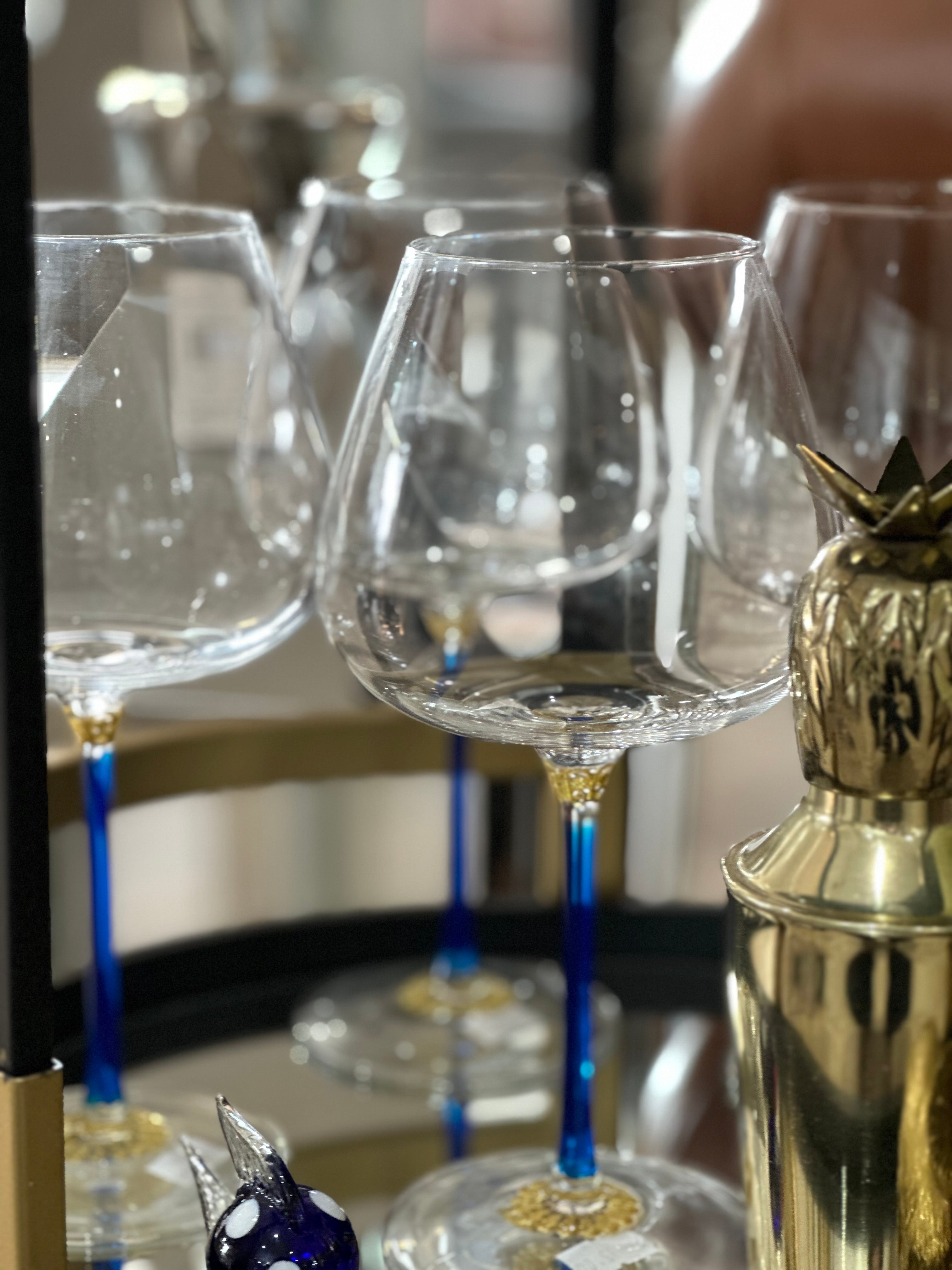 Elevate your celebrations with our exquisite Blue and Gold Stem Gin Glass. This timeless piece exudes sophistication and luxury, making it perfect for special occasions or indulging in your own soirées. Its elegant design adds a touch of refinement to any gathering, making it a must-have for any host or gifting opportunity. Immerse yourself in the world of luxury with our Blue and Gold Stem Gin Glass.