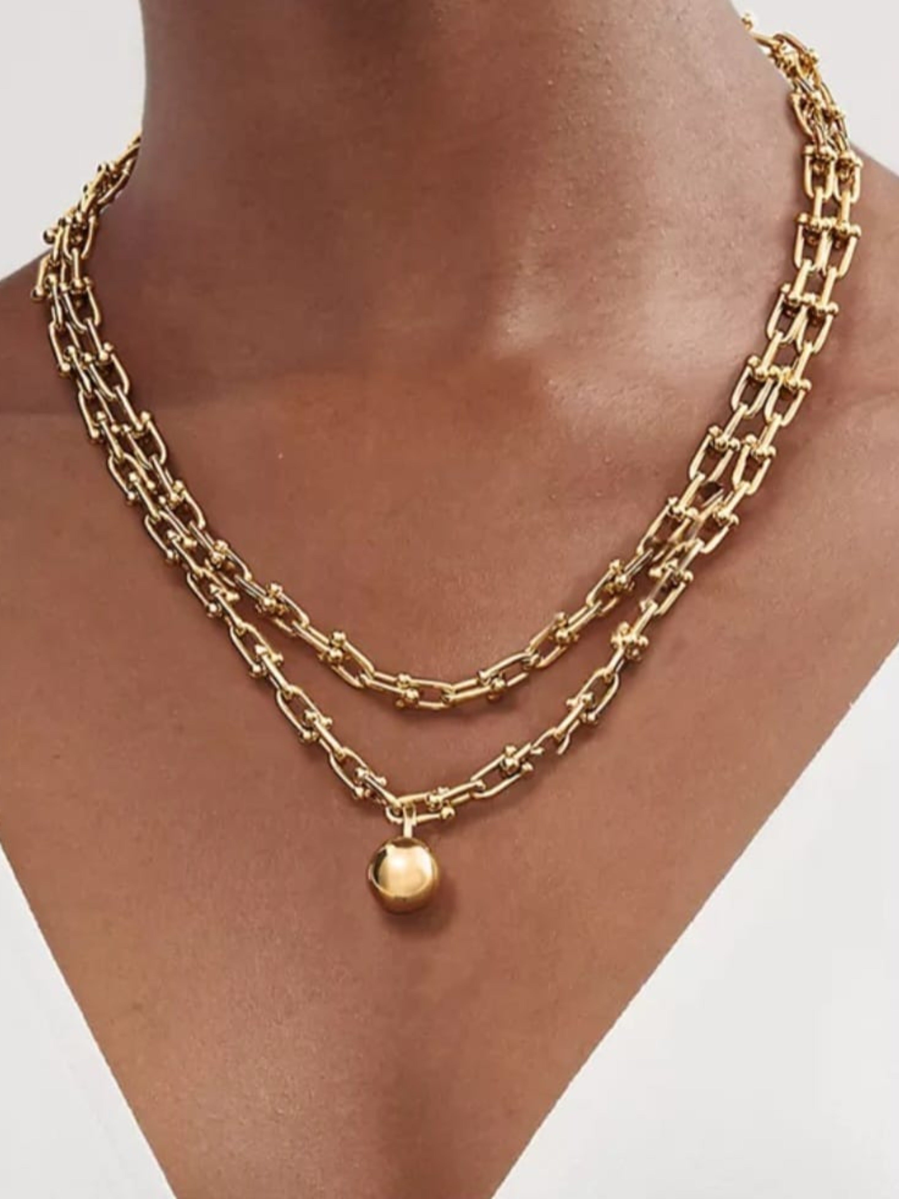 Gold plated chain necklace with ball pendent